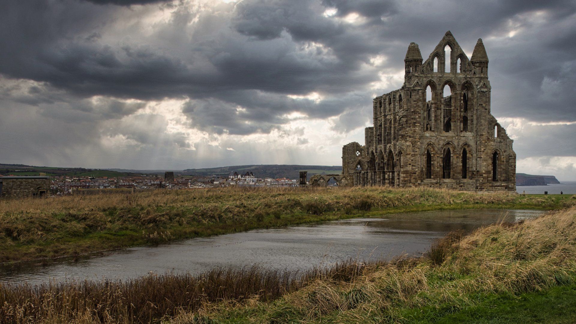 a moody sky over whitby abbey
