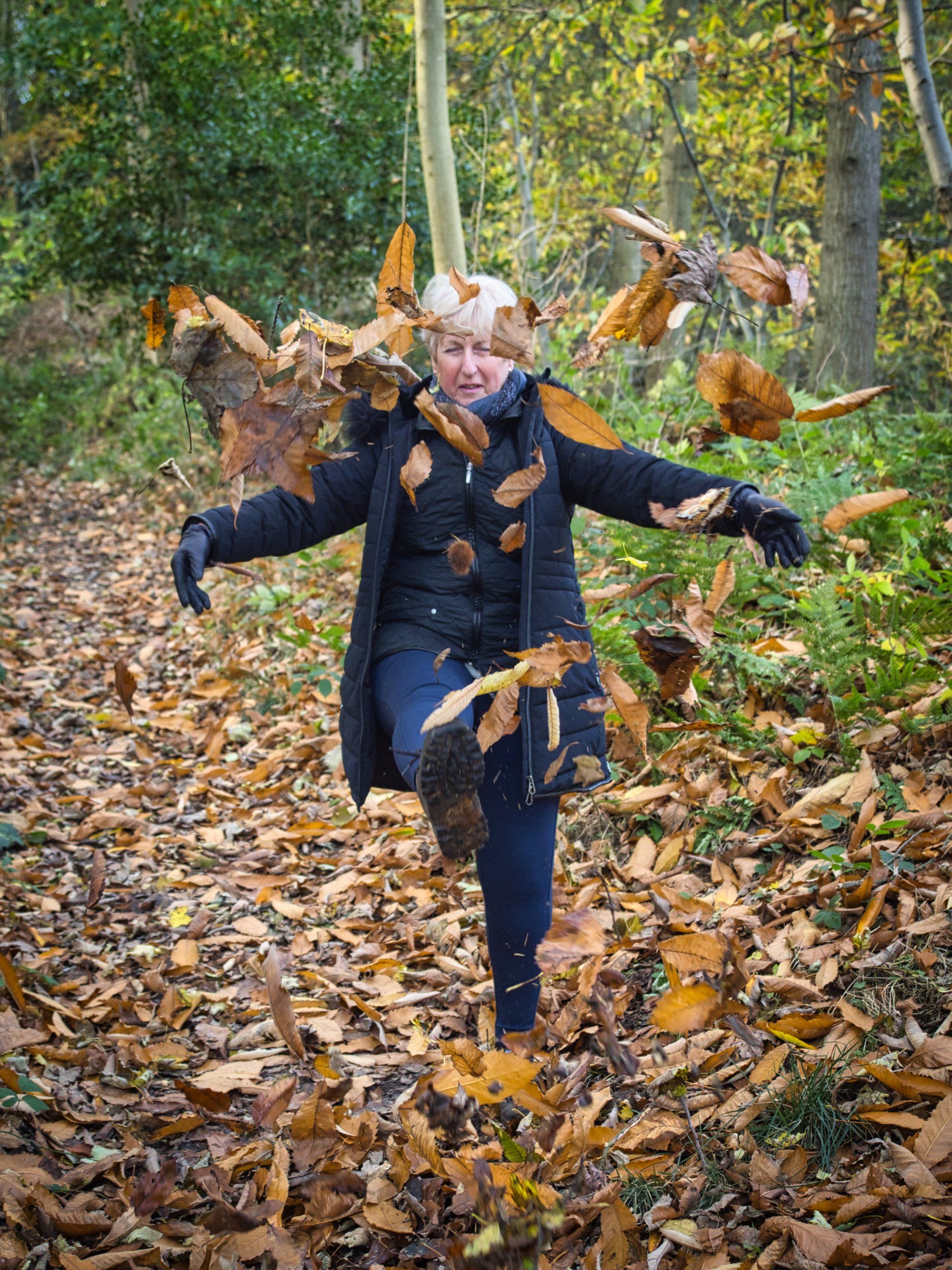 kicking the autumn leaves