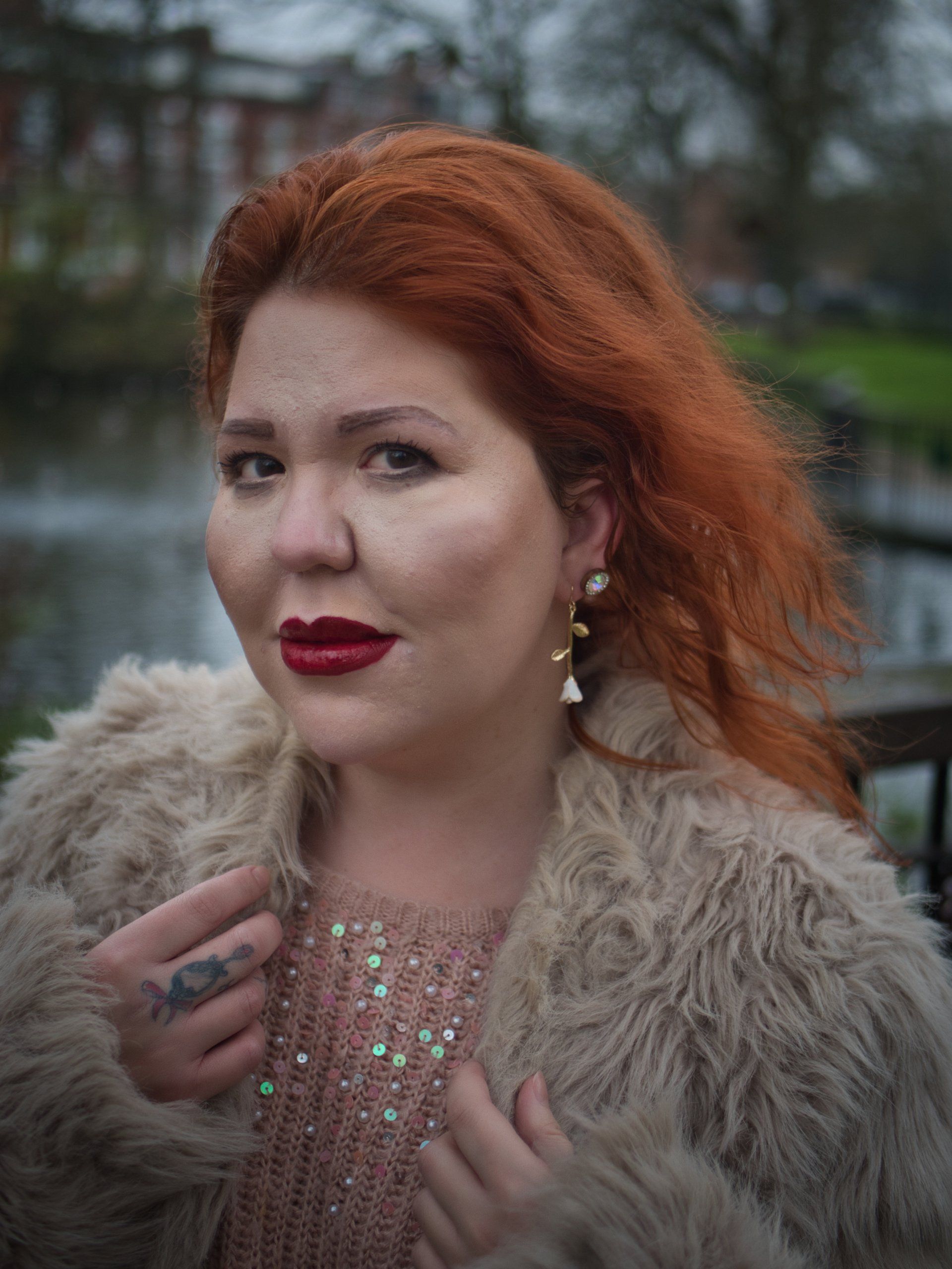 a female portrait taken in a park