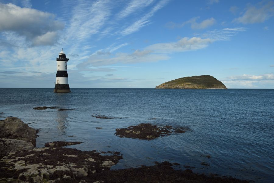 a view of Penman Lighthouse, and Puffin Island