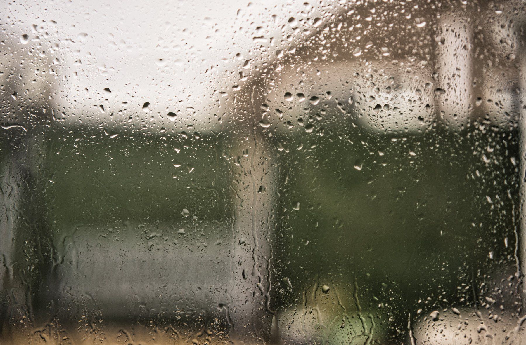 Rain raindrops on a window pane