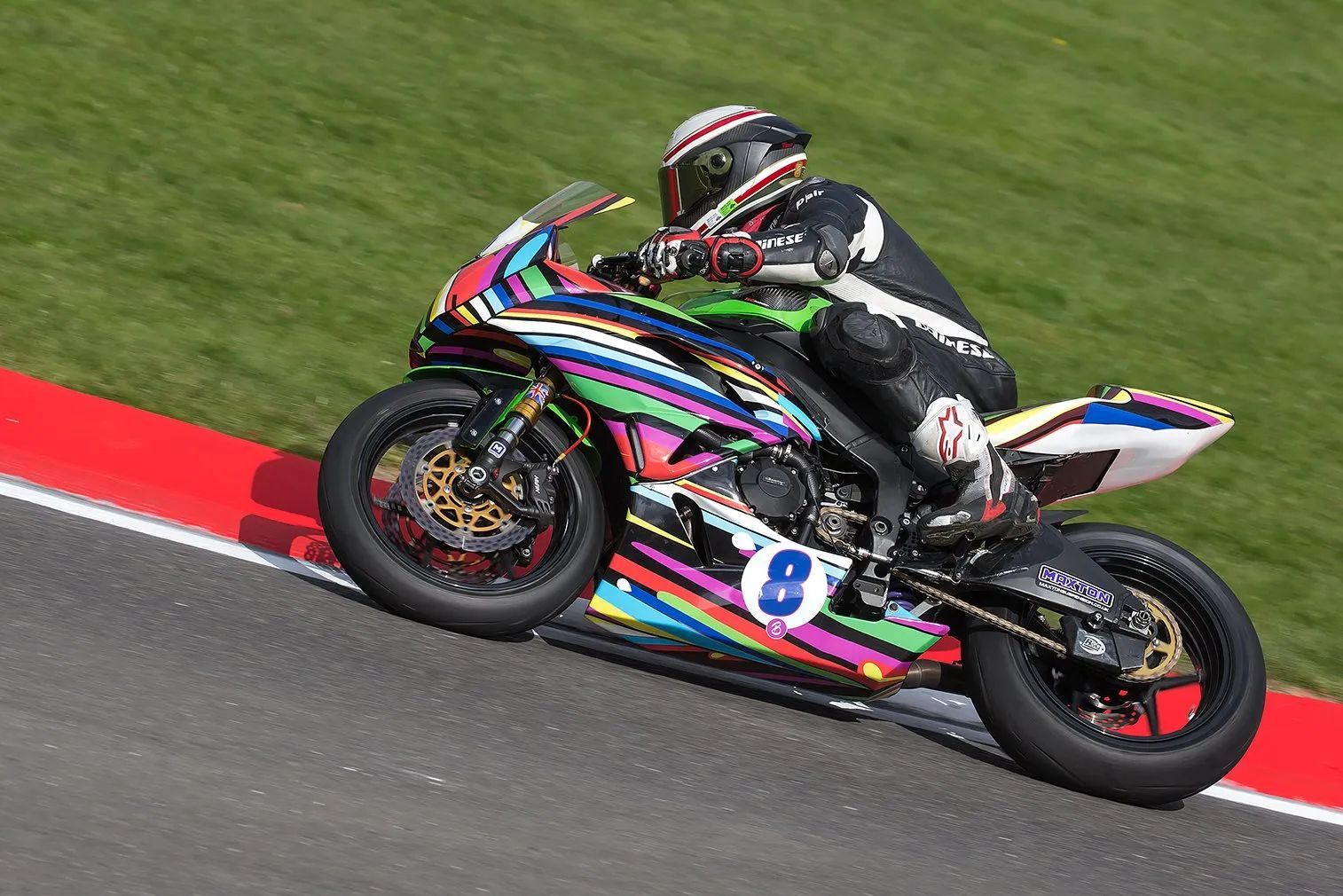 a motorcycle racing at Cadwell Circuit