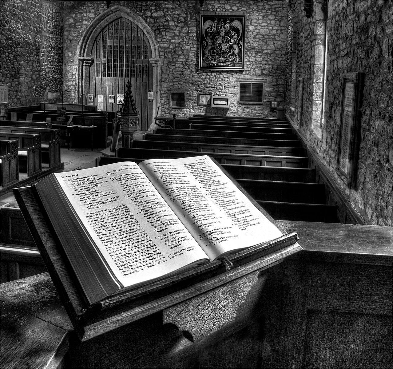 Reading Isaiah 31, by Dave Turner An open bible on a pulpit in a church