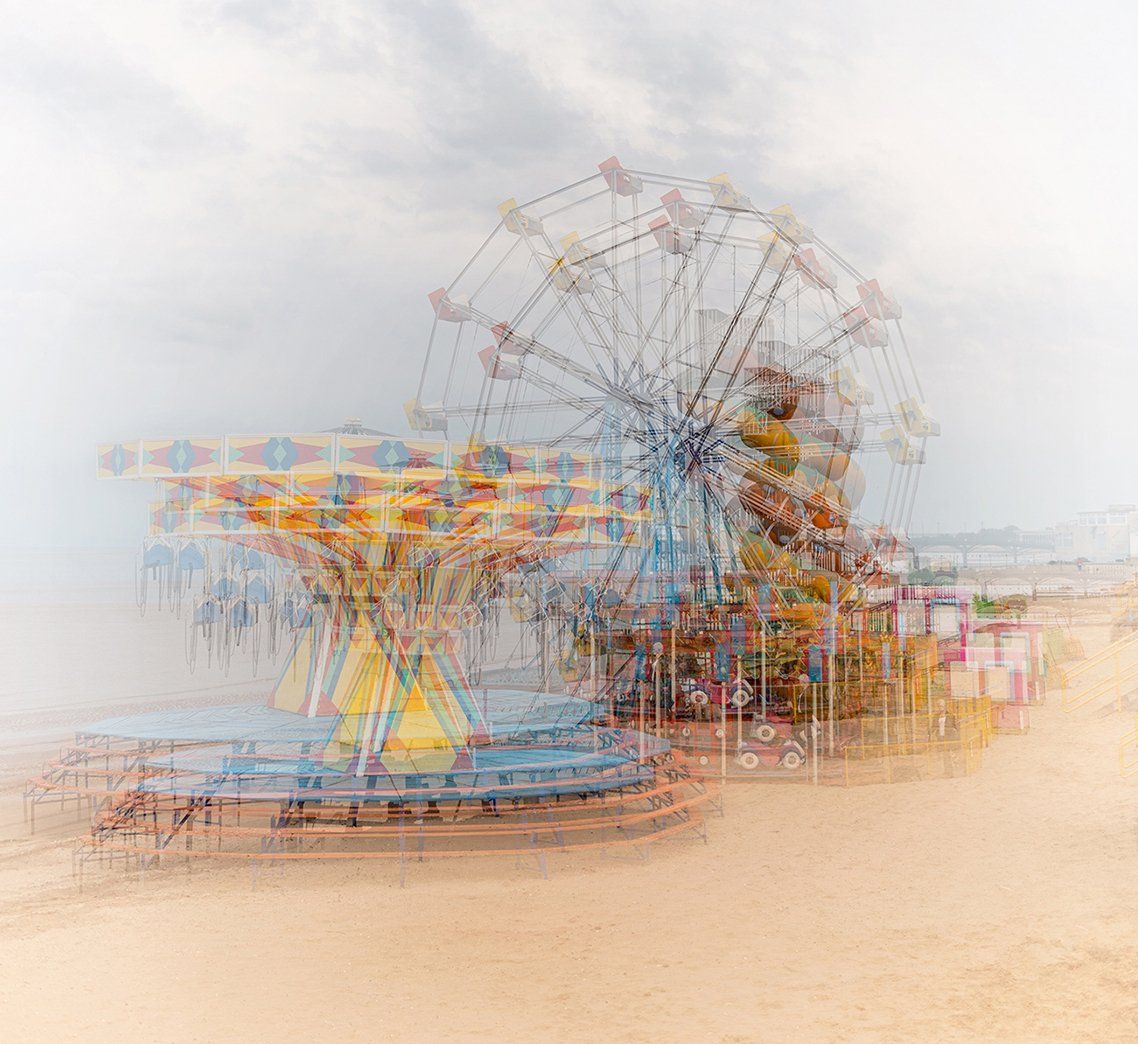 an impressionistic image of a fun fair roundabout