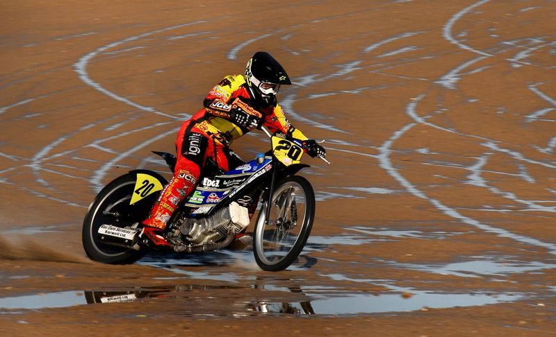 A motorcyclist sand racer