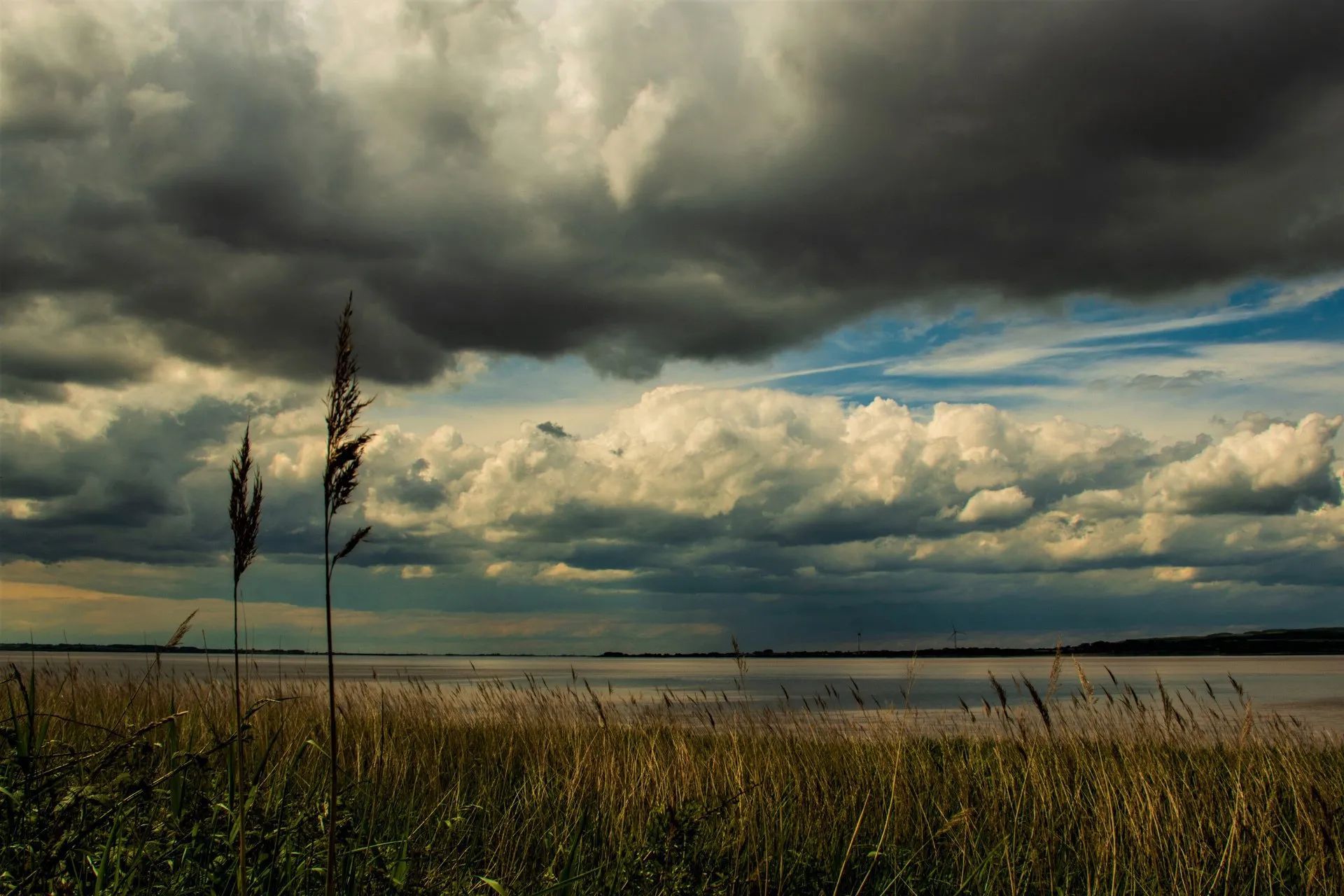 a storm threatening sky over water