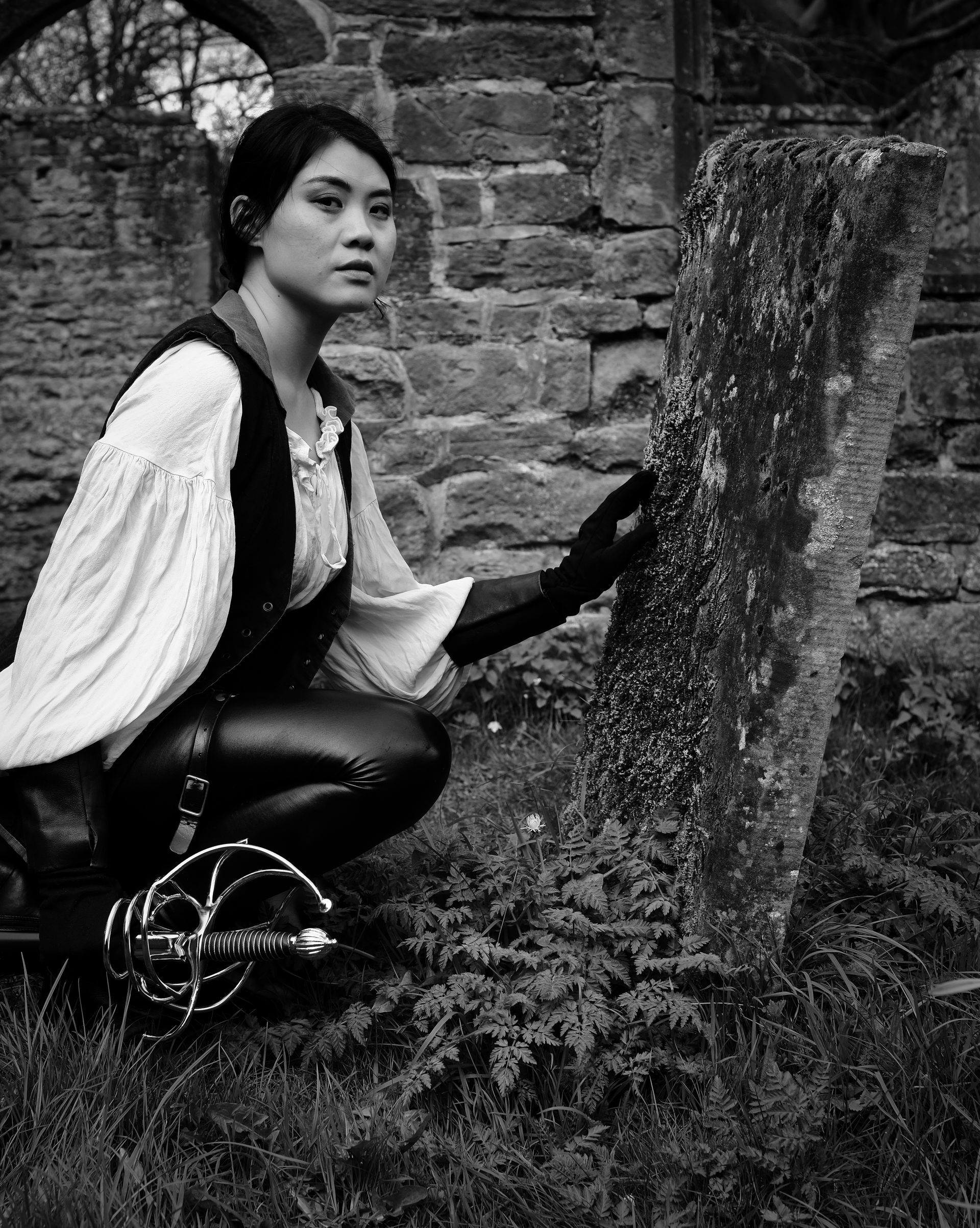 a cosplay warrior lamenting a fallen comrade