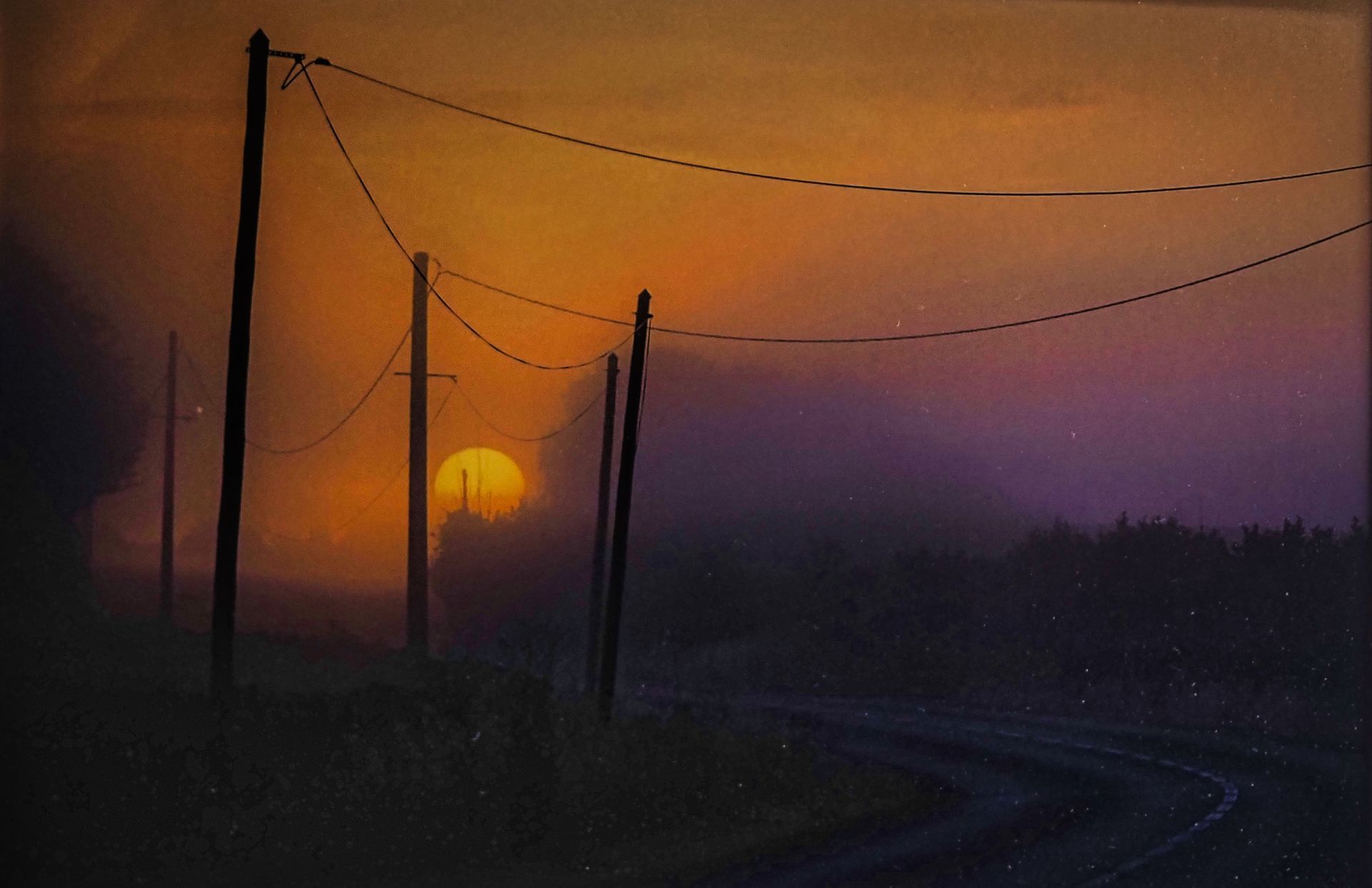 A winding road at sunset