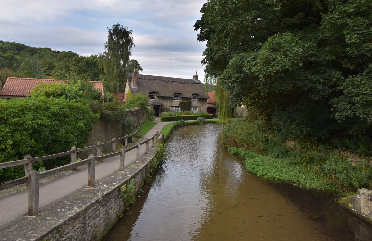 a waterside view of Thornton Le Dale, Yorkshire