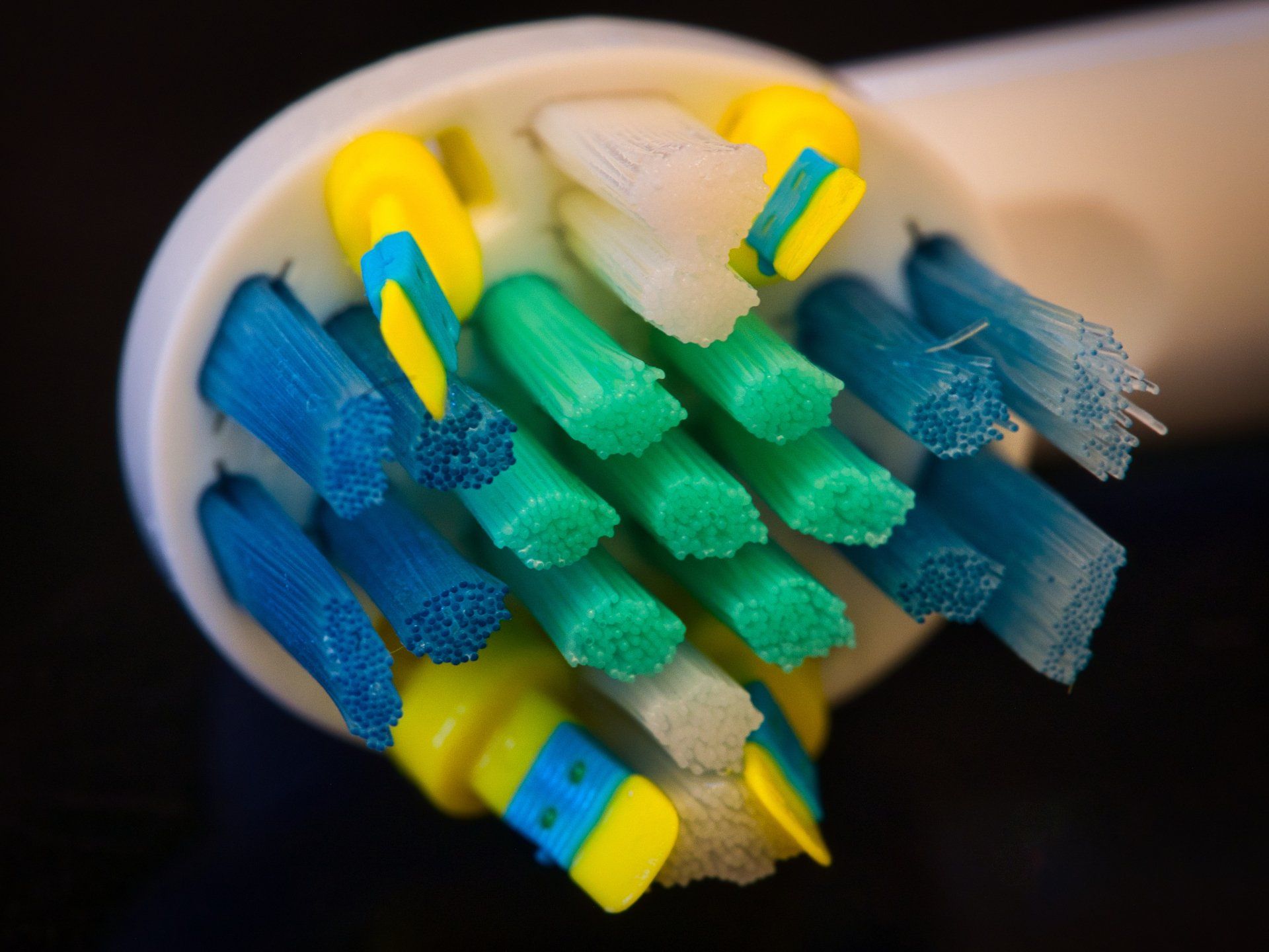 a close up of a toothbrush head