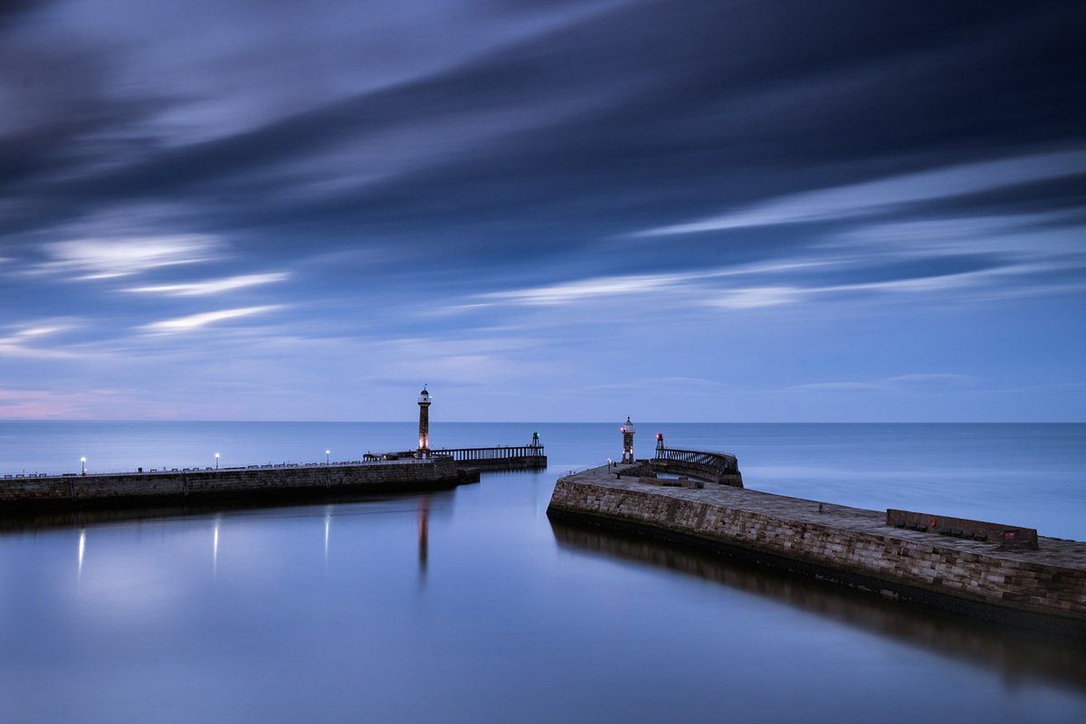 a twilight scene at whitby harbour