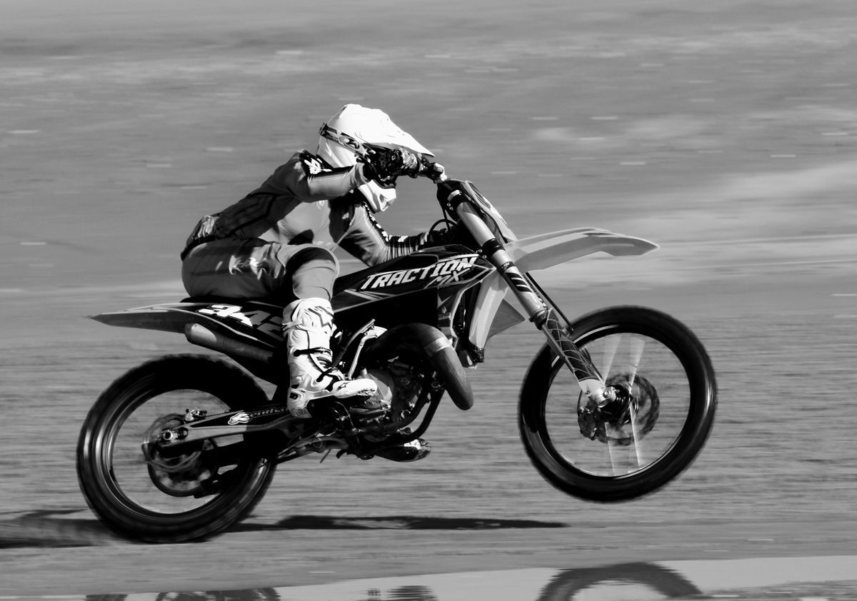a motorcycle racing at Cadwell Park circuit