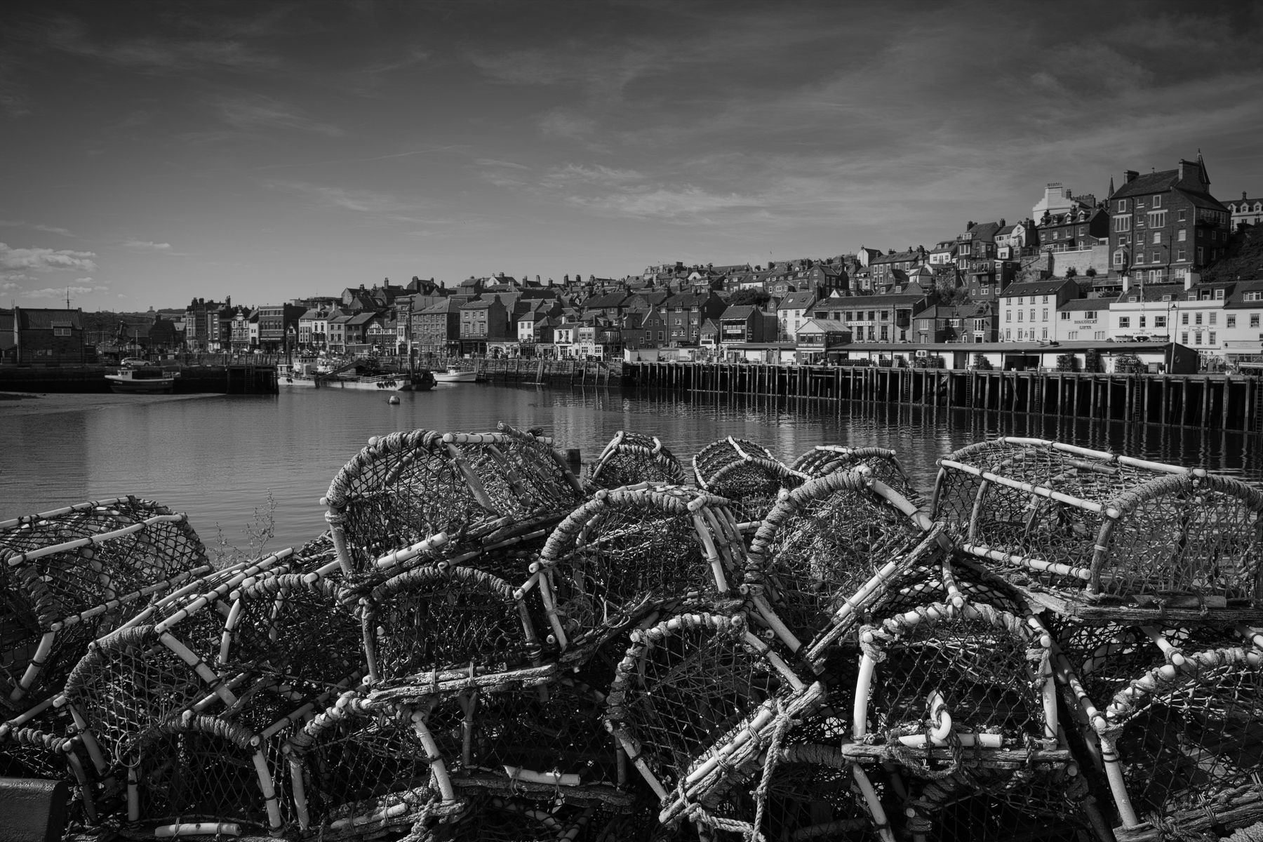 a monochrome view of Whitby Harbour