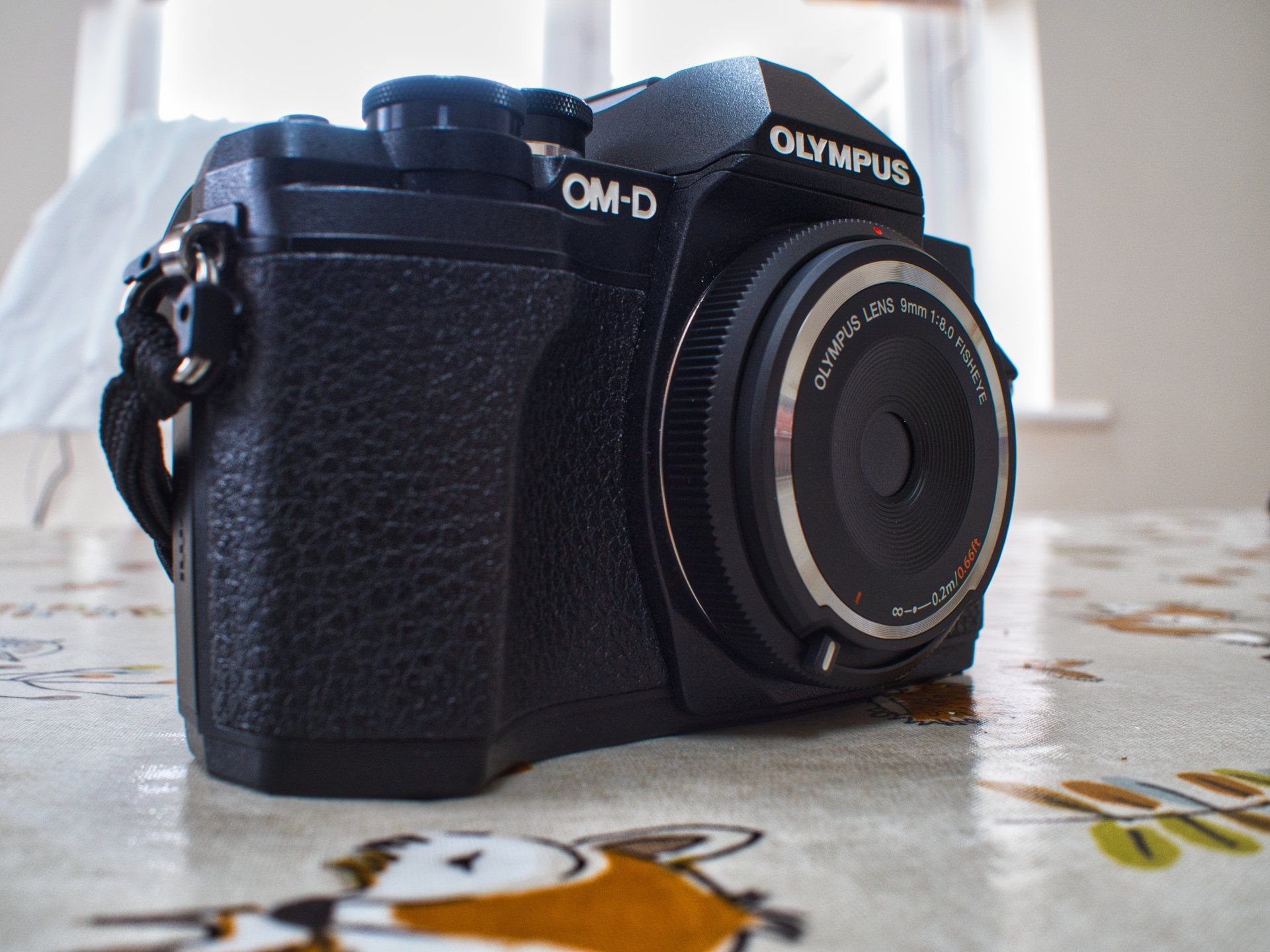 photos of the olympus body cap lens