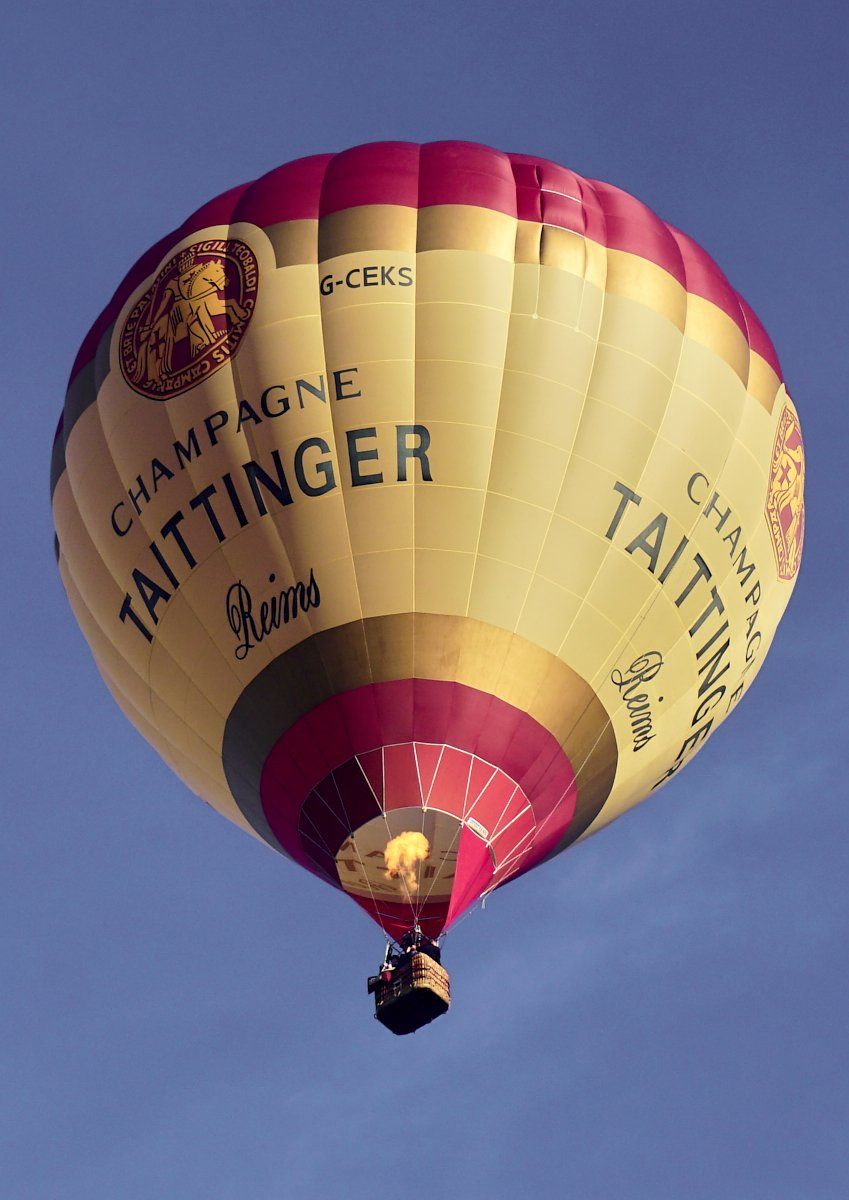 a hot air baloon rising into the air