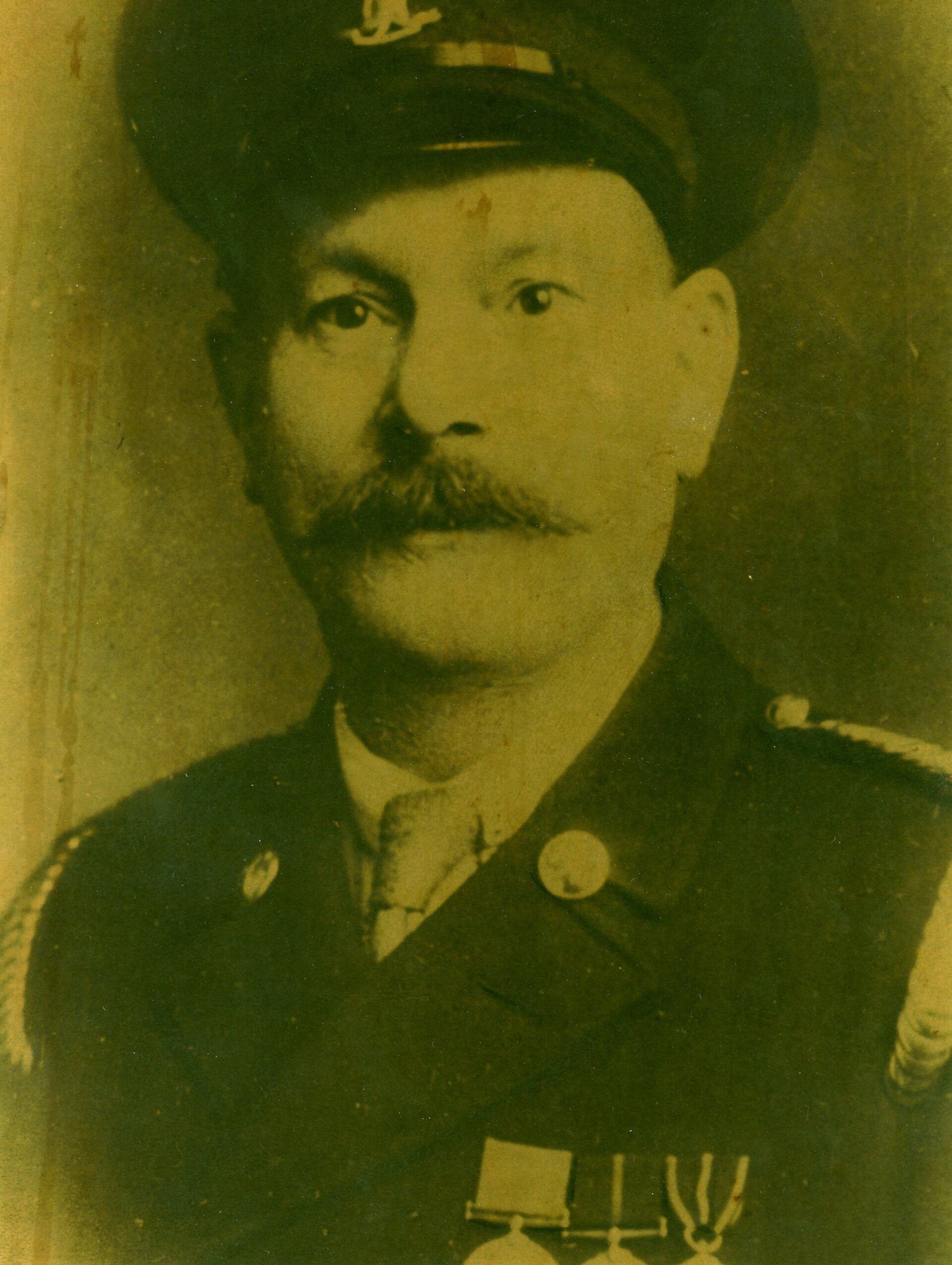 a portrait of fireman in full dress uniform