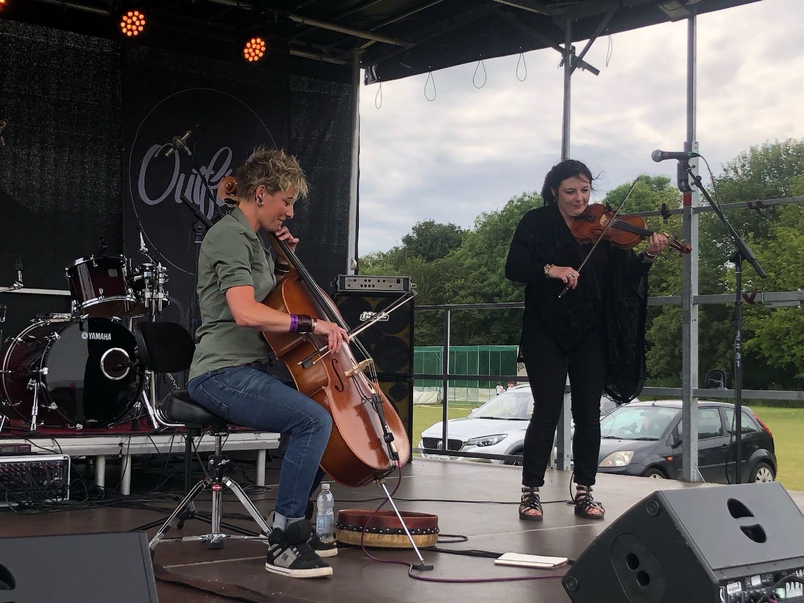 musicians on the stage at a music festival