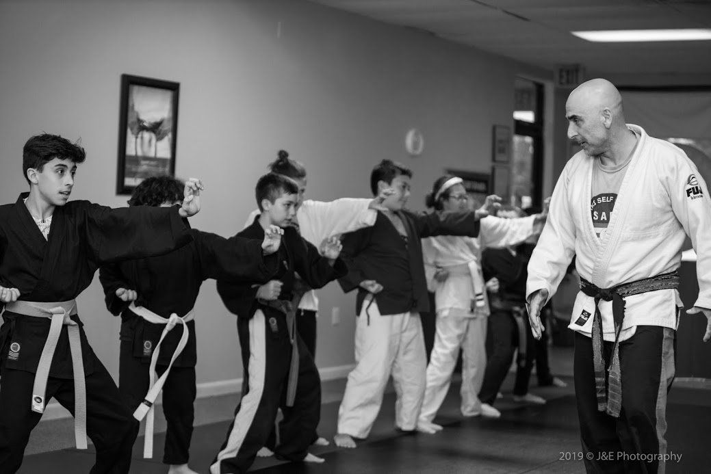 Children training in martial arts in Sarasota in a safe, structured environment
