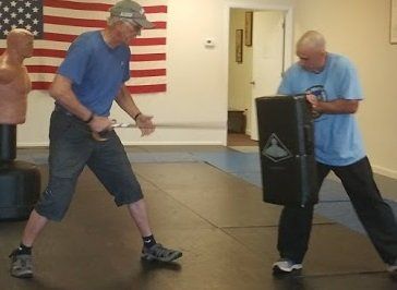 Adult Karate Classes Adult Karate class in Sarasota improving fitness, confidence and self defense skills