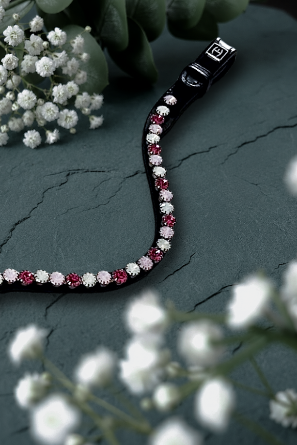 Let every hoofbeat echo with brilliance. Cherry Cove premium European leather Preciosa crystal browband. 8mm Preciosa crystals in pink, light pink opal and white opal. Adjustable quick-change with anti-slip grip. Slender anatomical deep U-shape fit. All sizes. By Ice Equestrian.