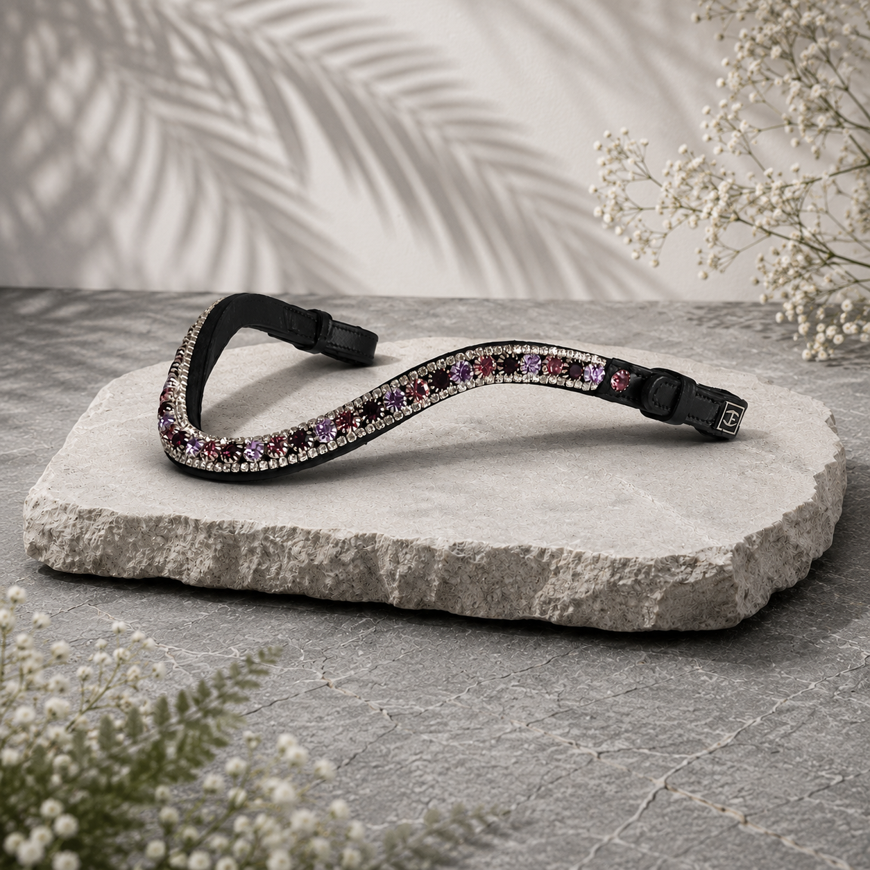 Let every hoofbeat echo with brilliance. Velvet Truffle premium European leather Preciosa crystal browband. Triple-row design with 8mm Preciosa crystals in Amethyst, Amethyst Opal and Violet. Adjustable quick-change with anti-slip grip. Anatomical deep U-shape fit. All sizes. By Ice Equestrian.