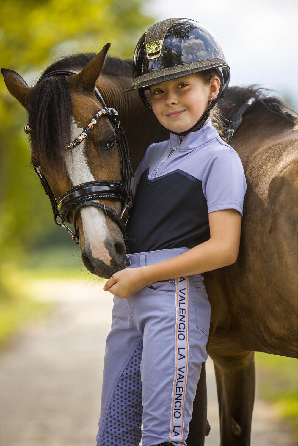 Dainty Elite Diem Italian leather bridle for small ponies and ponies. 12mm Swarovski crystals in Capri Gold, Dark Indigo and Crystal. Quick-change with anti-slip grip. Anatomical contoured fit. By Ice Equestrian