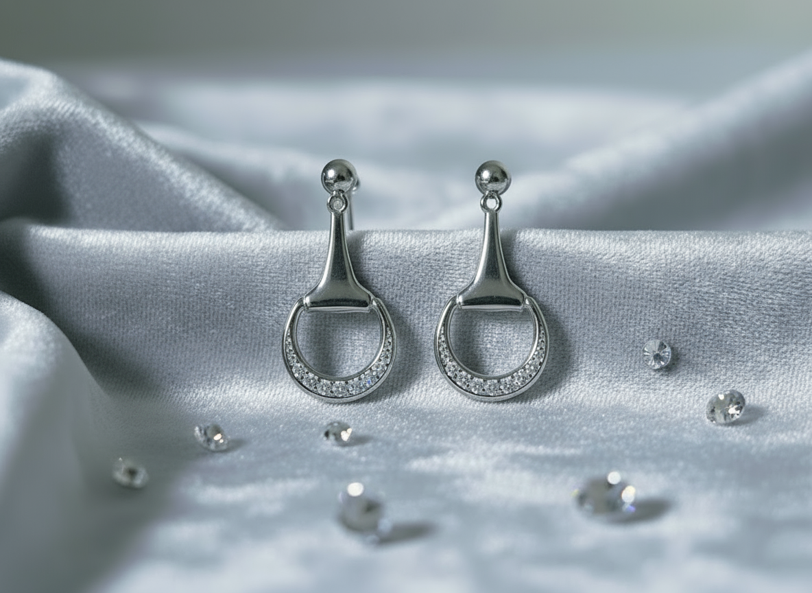 Regal Heritage Snaffle Sparkle stud earrings. Handcrafted sterling silver half-snaffle bit design with rhodium plating and zircon. By Ice Equestrian