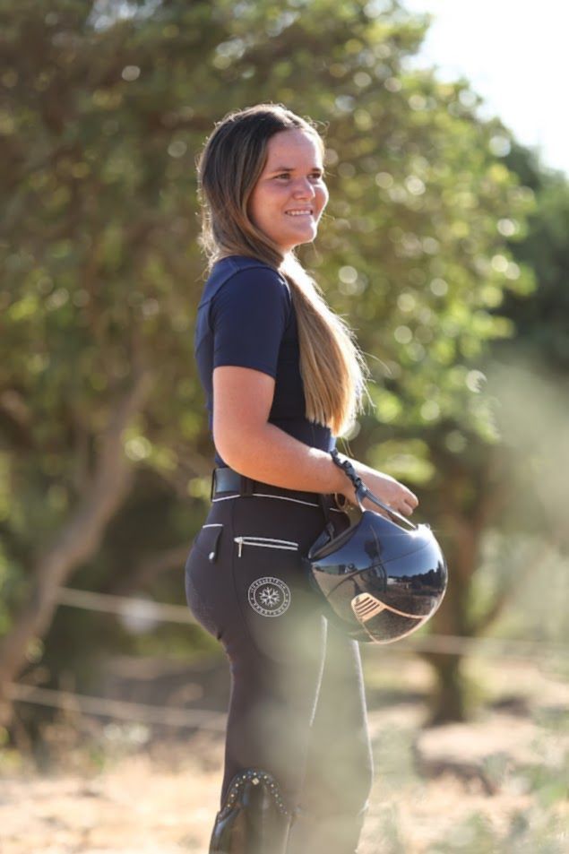 Navy Reign adult equestrian short sleeve training top. Breathable 4-way stretch fabric with perforated back ventilation and UVP 40+ sun protection. By Ice Equestrian