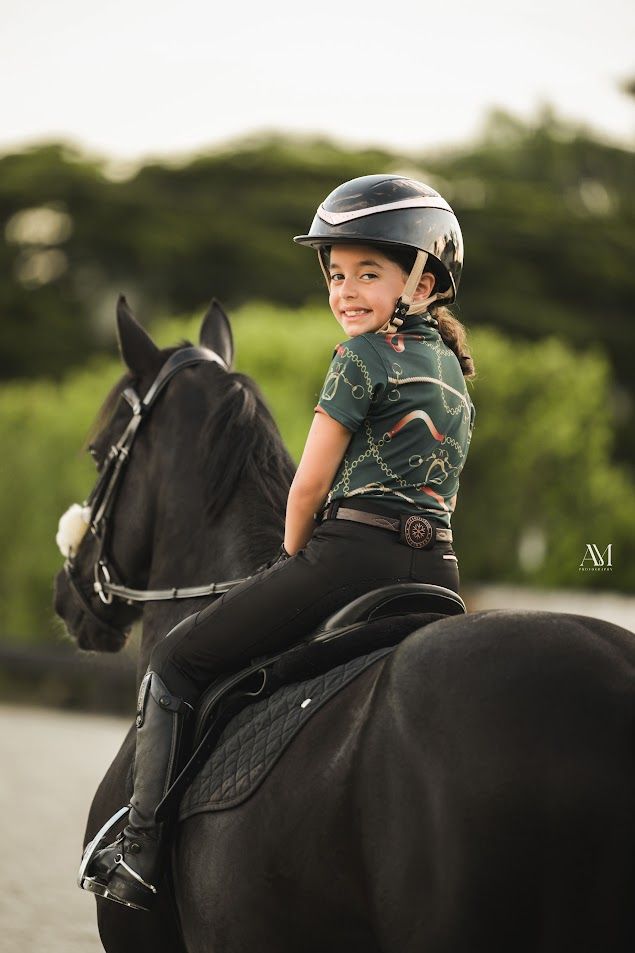 Discounted jasmin young rider short sleeve training top. Moisture-wicking 4-way stretch fabric with high collar and built-in UV protection. By Ice Equestrian