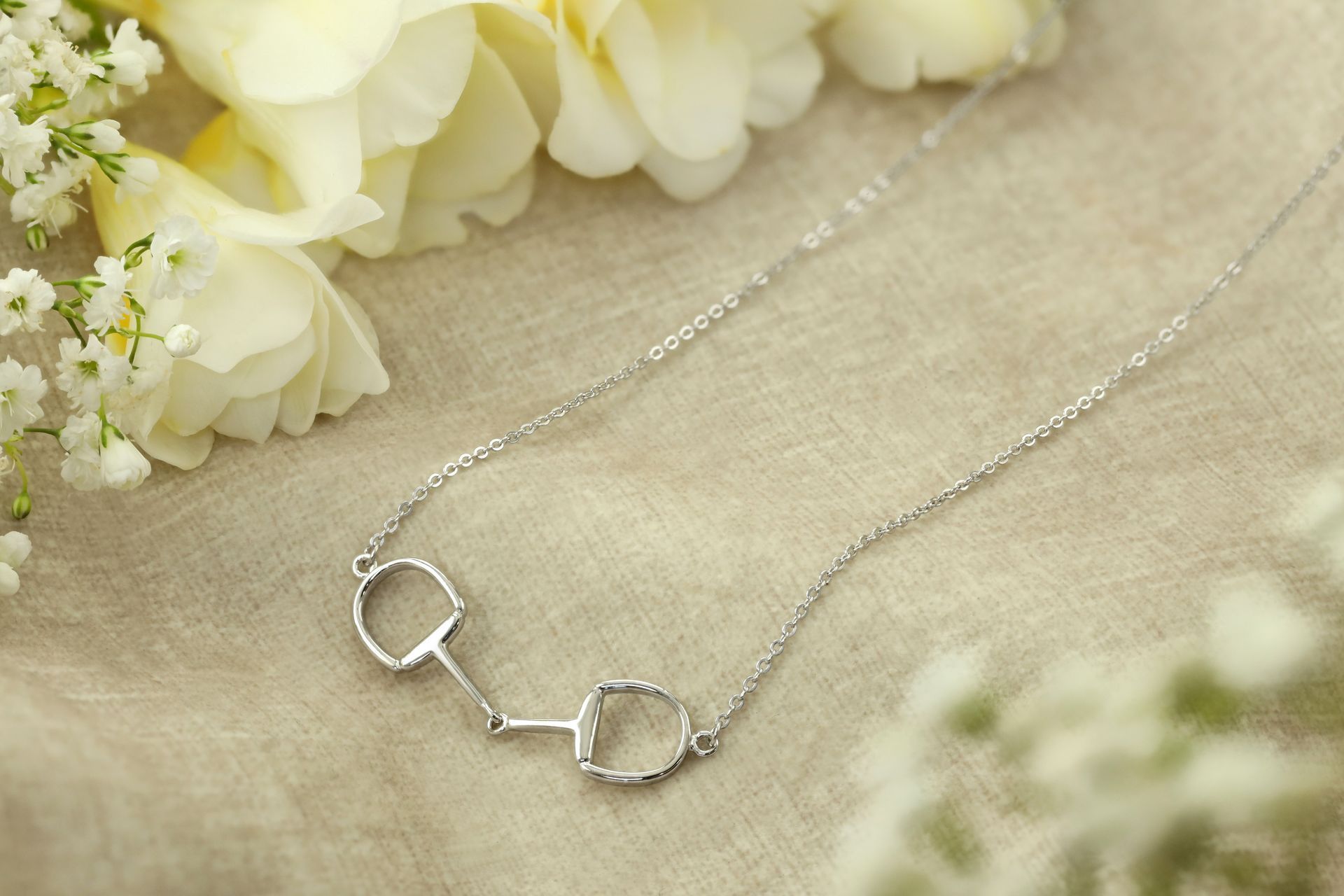 Lexi snaffle bit necklace with adjustable chain. Handcrafted sterling silver. By Ice Equestrian