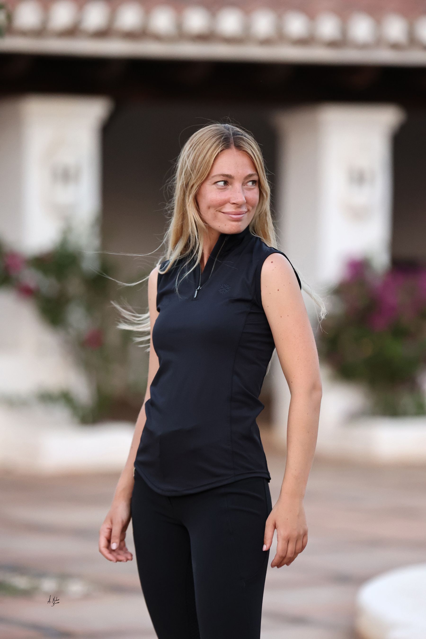 Black Reign adult equestrian sleeveless training top. Breathable 4-way stretch fabric with perforated back ventilation and UVP 40+ sun protection. By Ice Equestrian