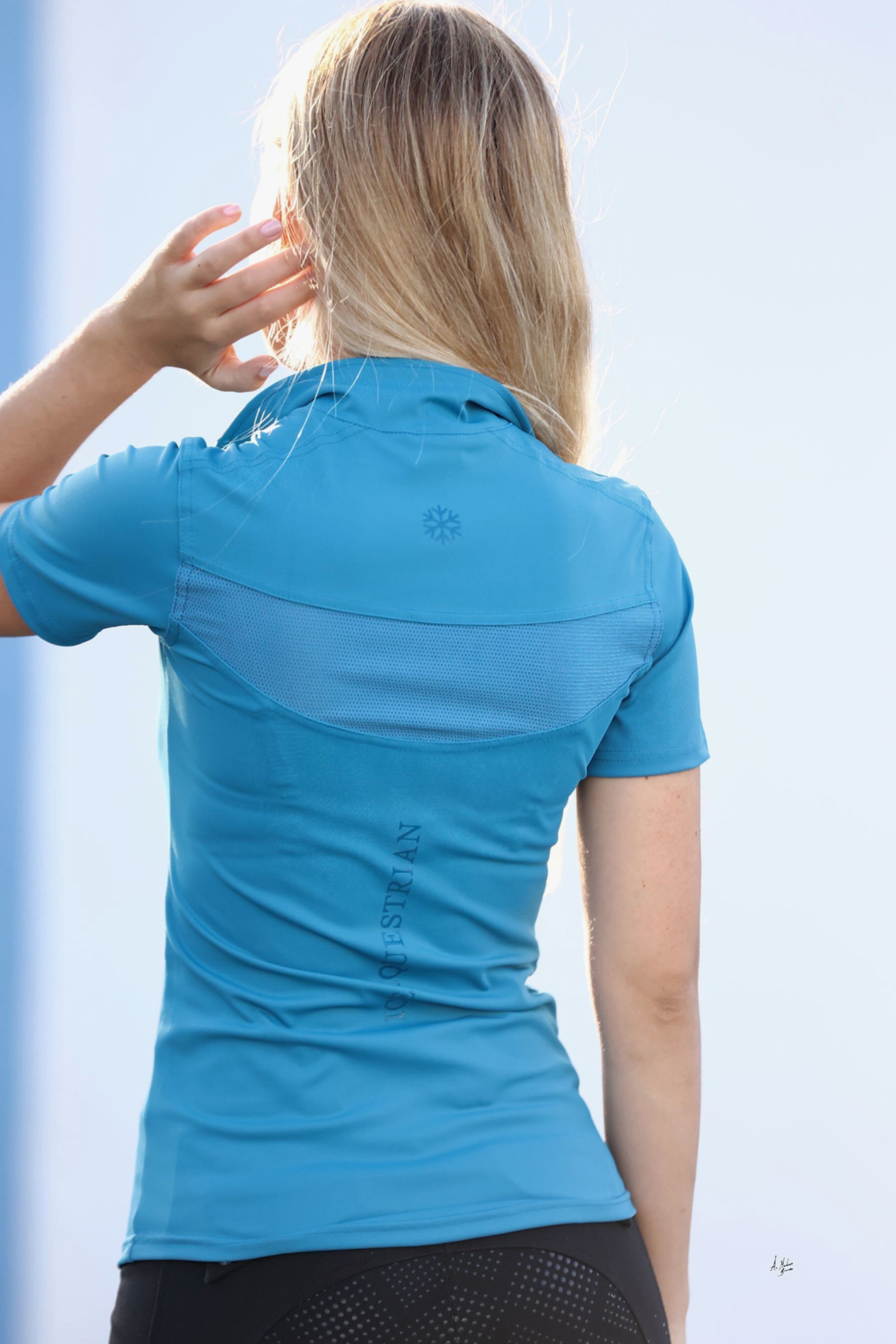 Teal Reign adult equestrian short sleeve training top. Breathable 4-way stretch fabric with perforated back ventilation and UVP 40+ sun protection. By Ice Equestrian