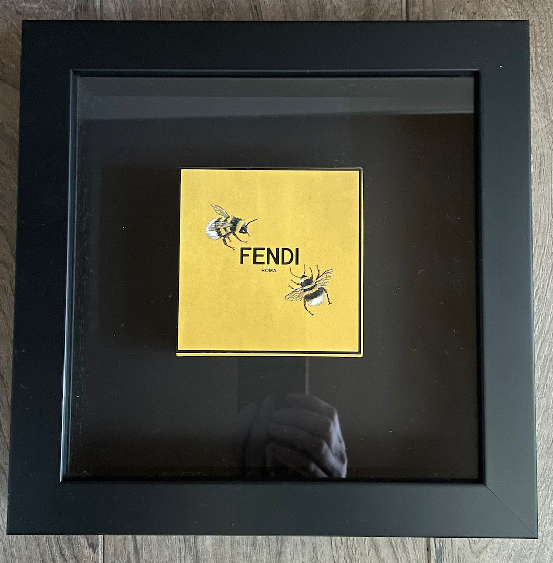 Painting on a Fendi box of bees by artist Anne-Marie Ellis