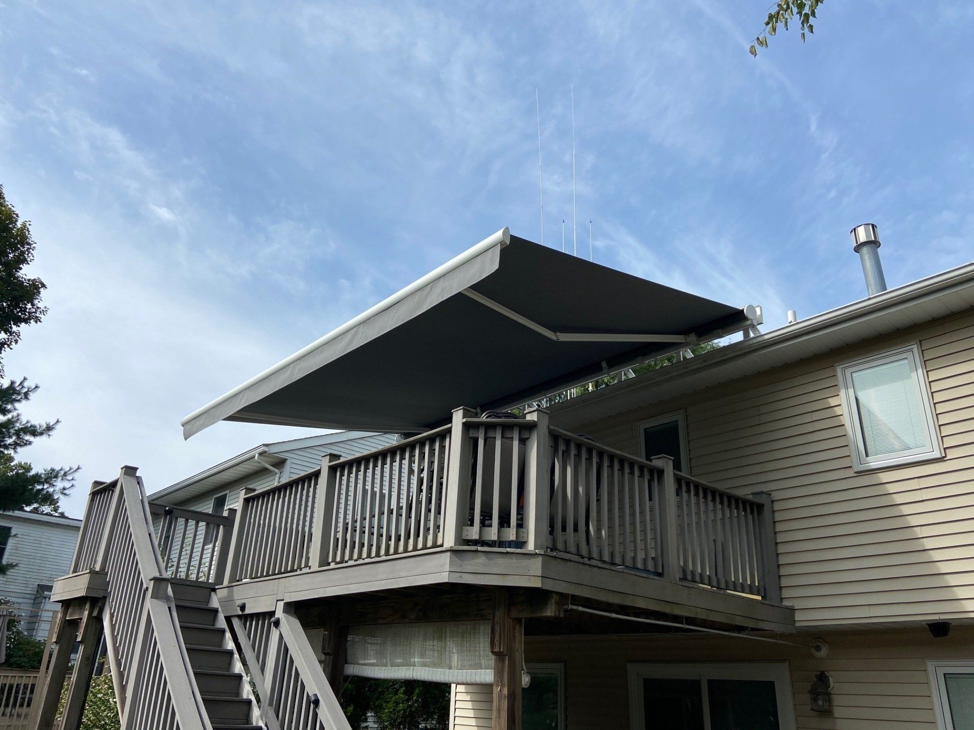 roof mounted retractable awning