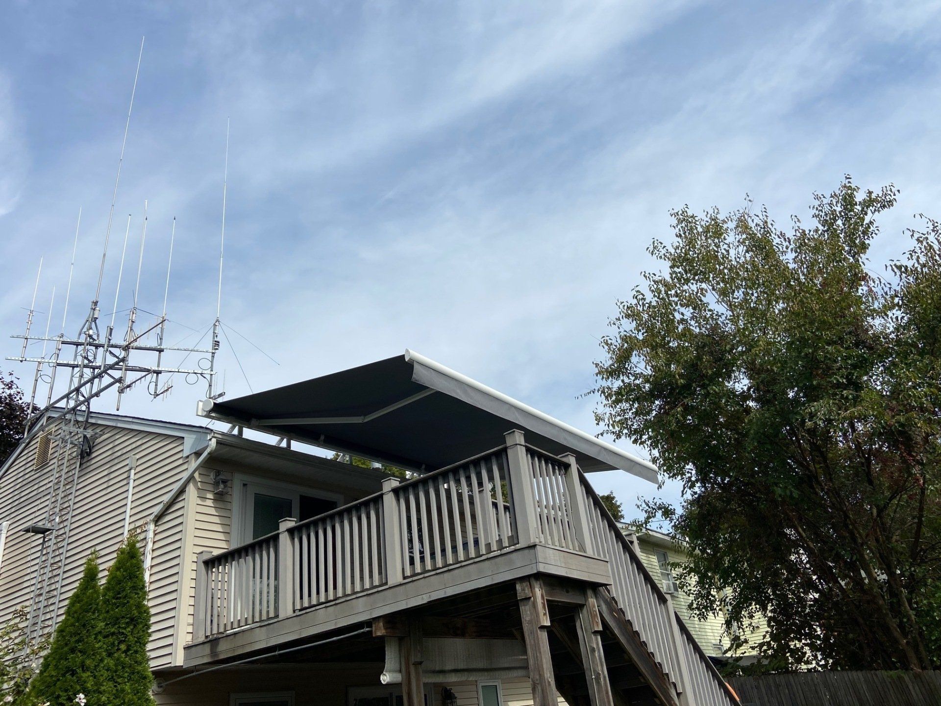 roof mounted retractable awning