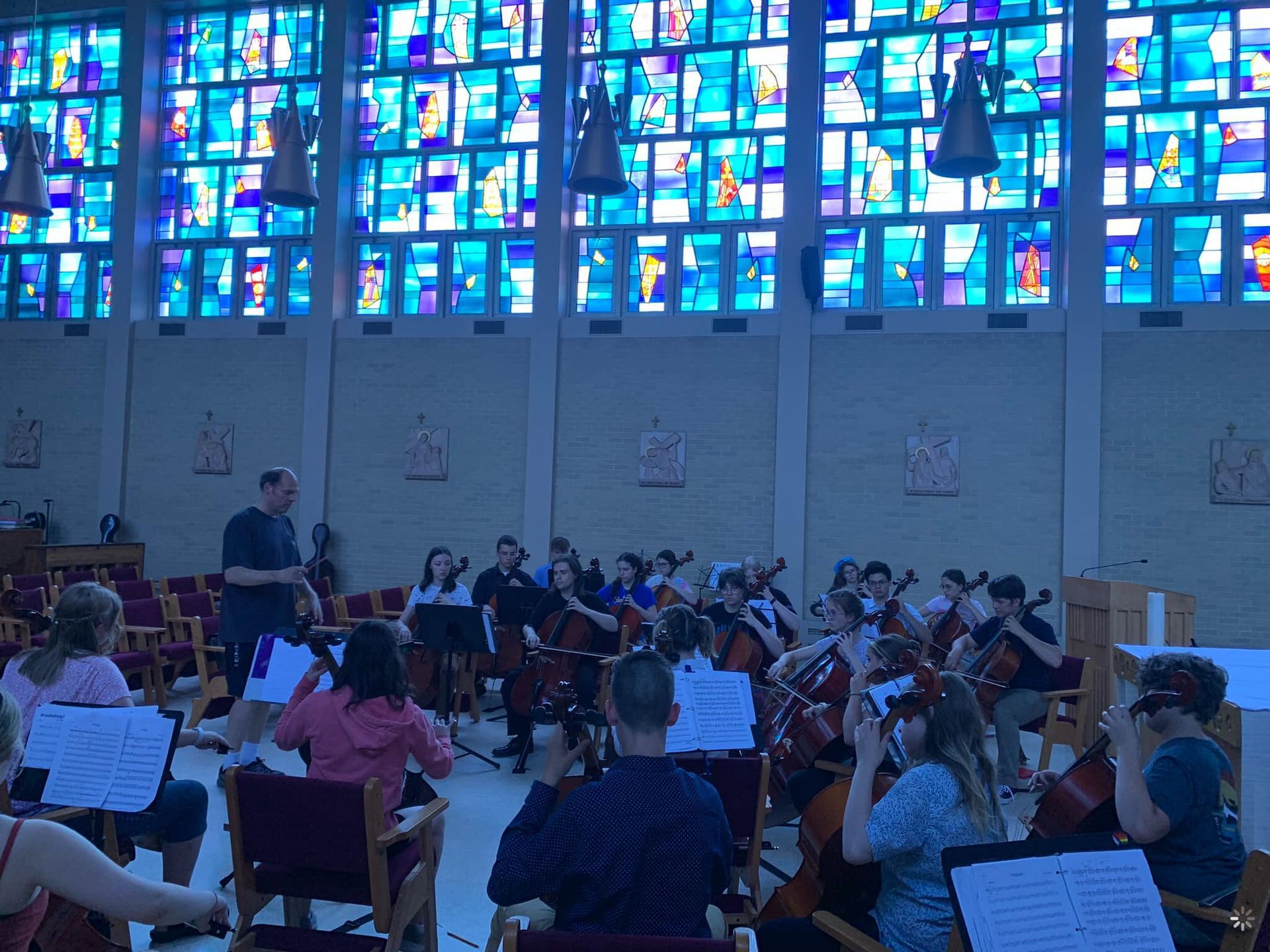Cellists in chapel