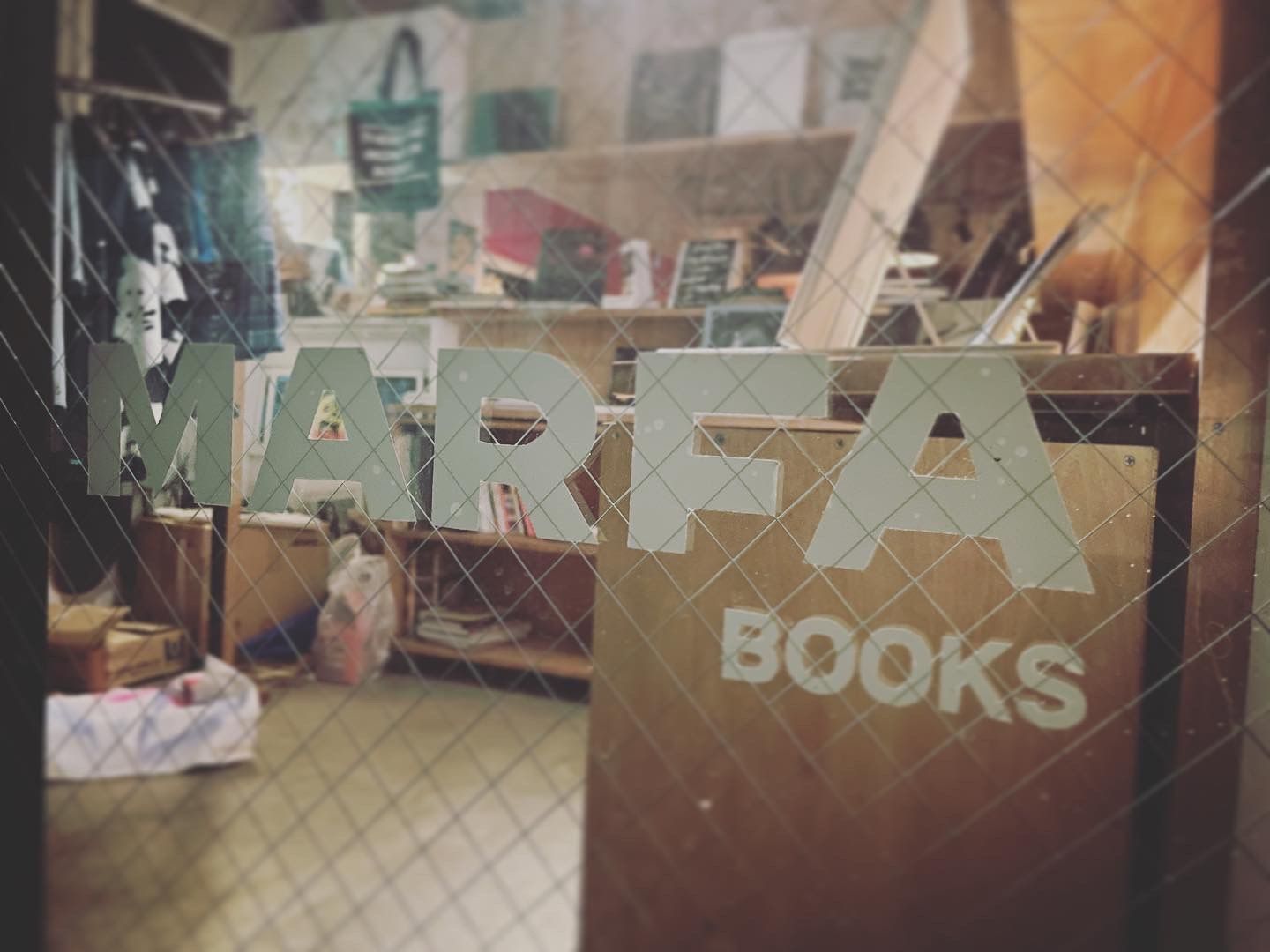 Custom designed vinyl letters on lightbox for Marfa bookstore located in Sapporo, JP.