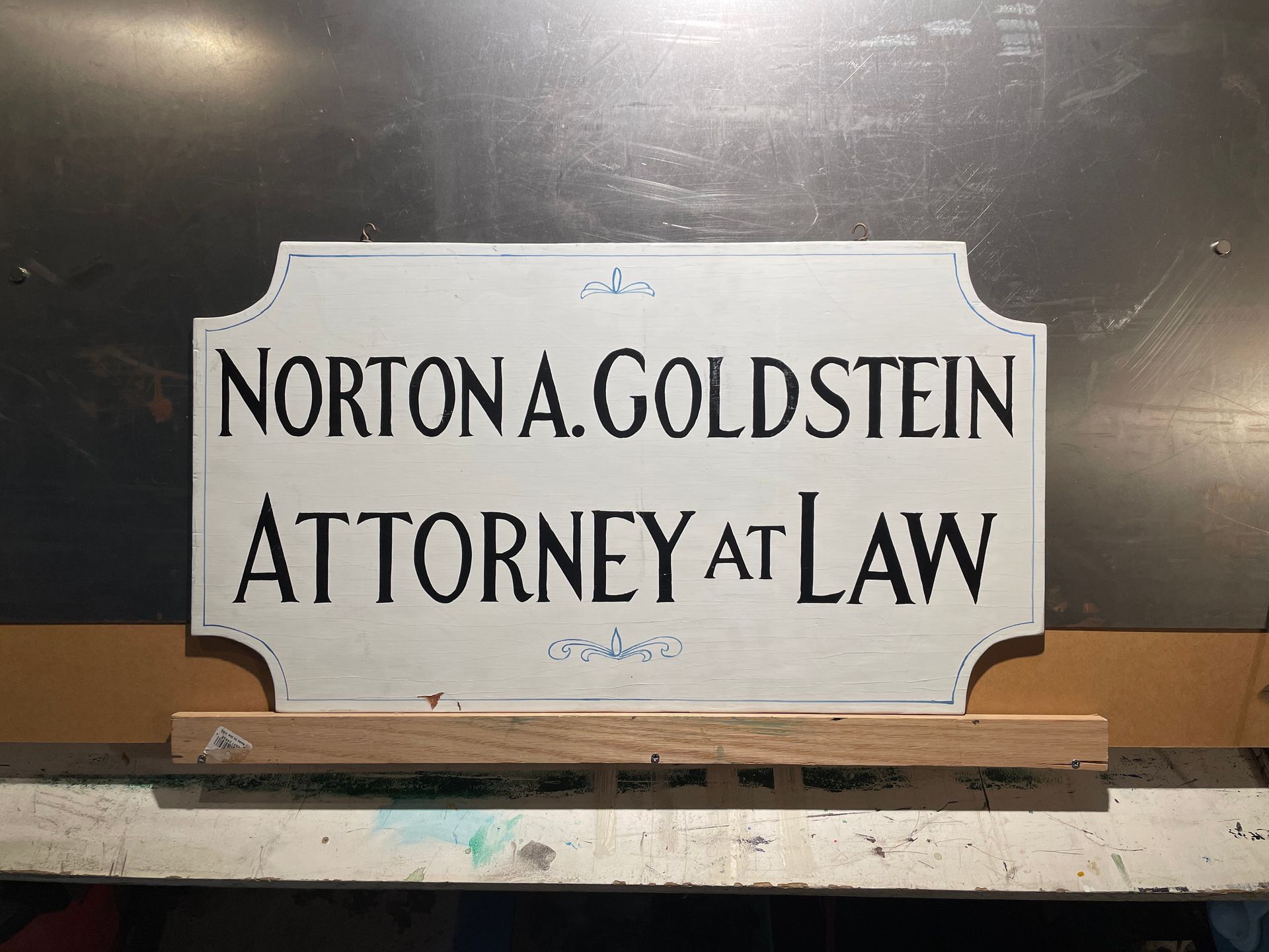 Original picture of CPA sign before restoration.