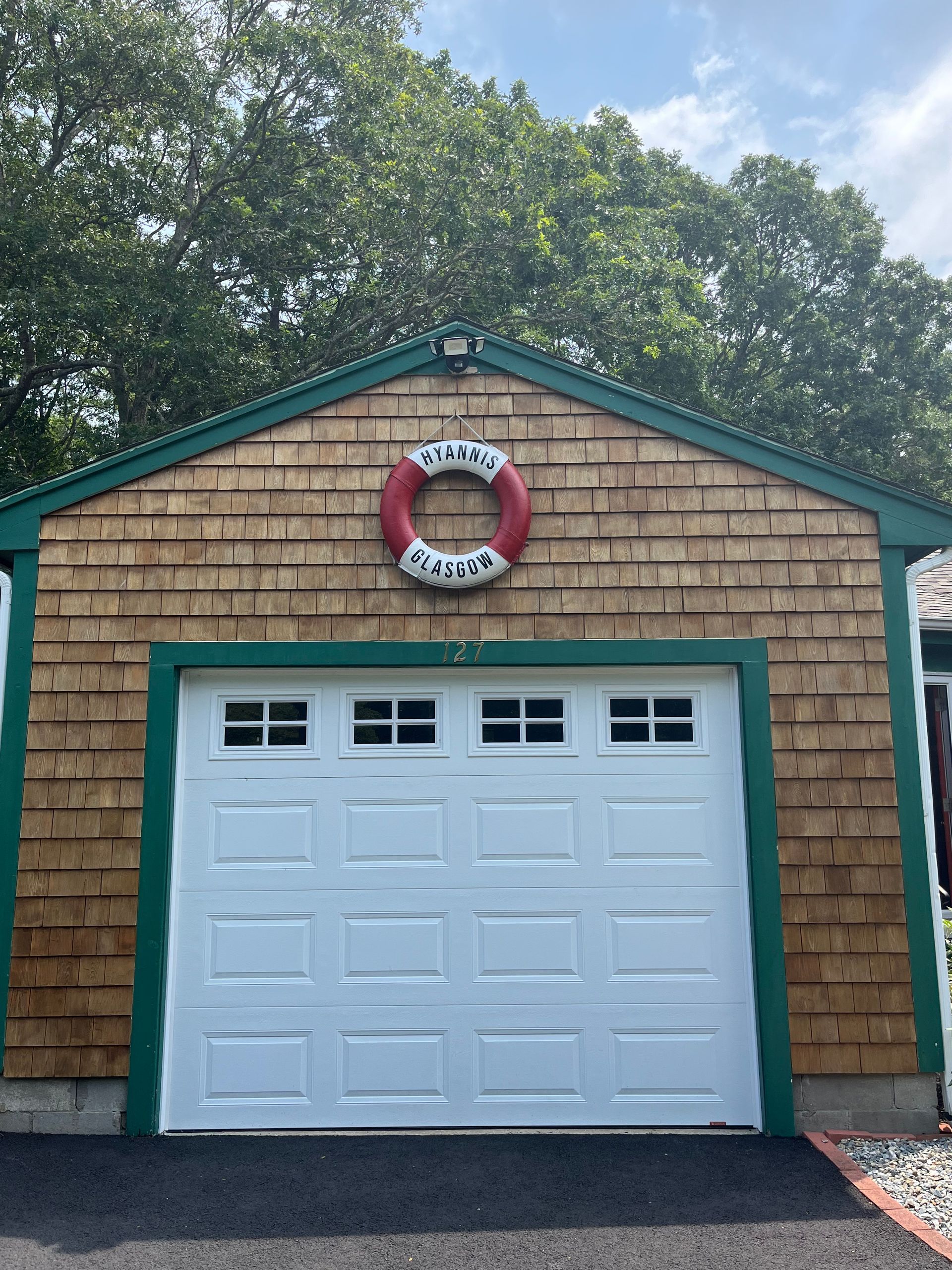 Hand painted life preserver for Cape Cod residence.