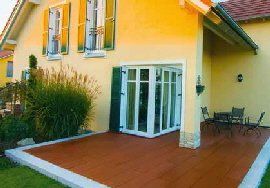 hochwertiger Cerapiano Terrassenbelag,. UV und Frostbeständig verlegt durch Grothues & Theis - hier in Farbe rot