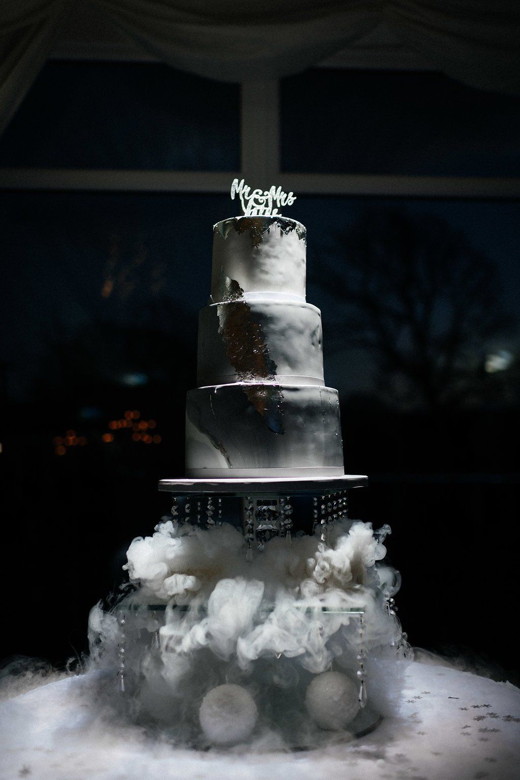 Oldwalls Gower Wedding Dry Ice Winter Wonderland cake display