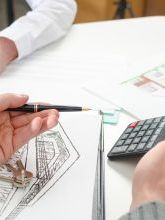 team of engineers working on a prototype in a technology lab.