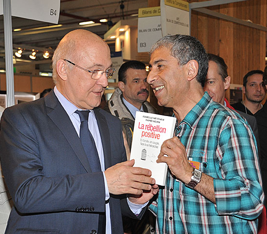 Hamid AGUINI avec l'ex ministre du travail Michel SAPIN