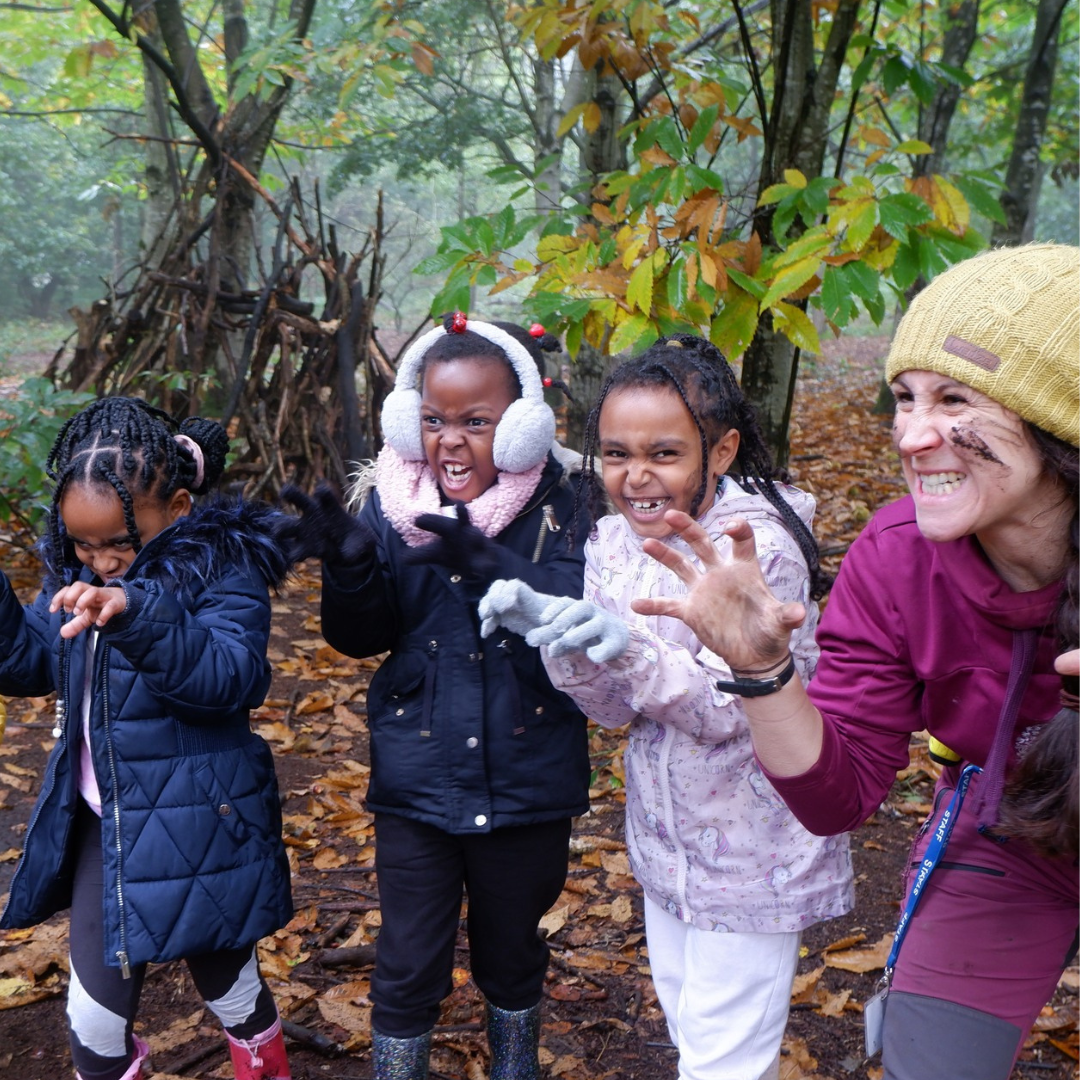 Leanne from Communitree with group of children playing foxes and rabbits