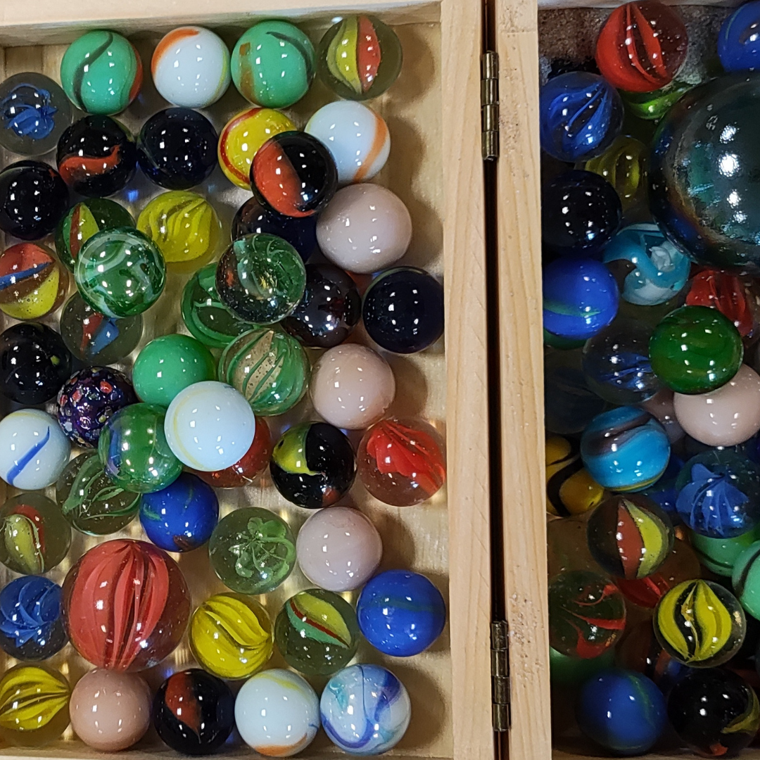 Assortment of marbles in a box
