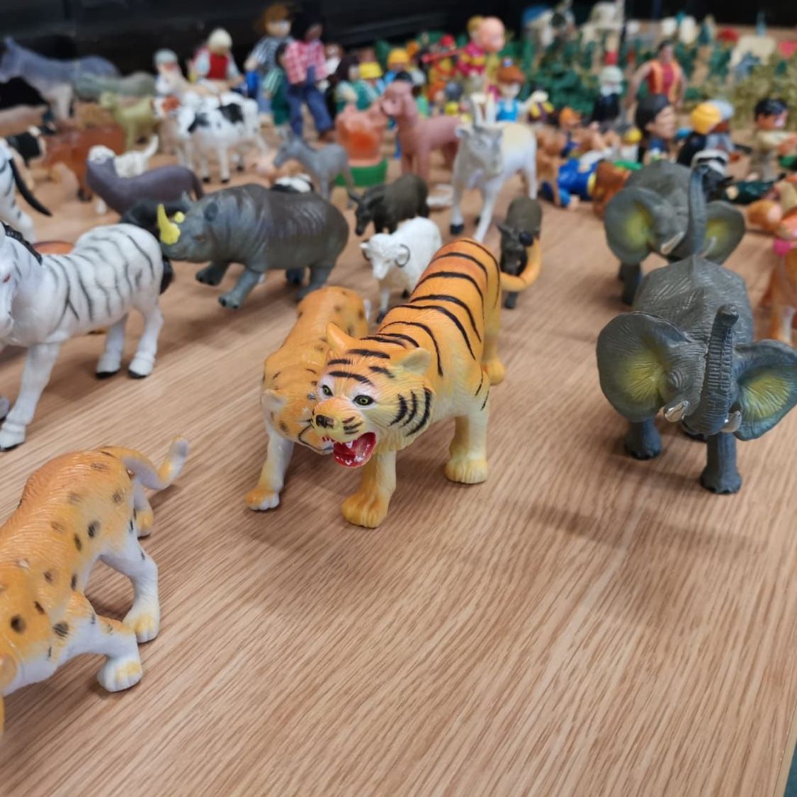 An assortment of plastic animal toy figures