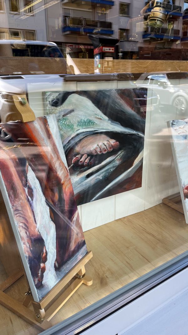 Wunderwerke Füße Bilder im Schaufenster des Schusters
