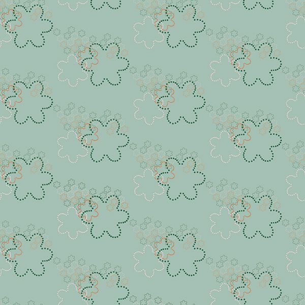 Delicate fabric design with florals outlined in dots on a pastel powdered green.