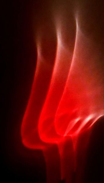 Drei Flammen Flammen, Spiegelung,