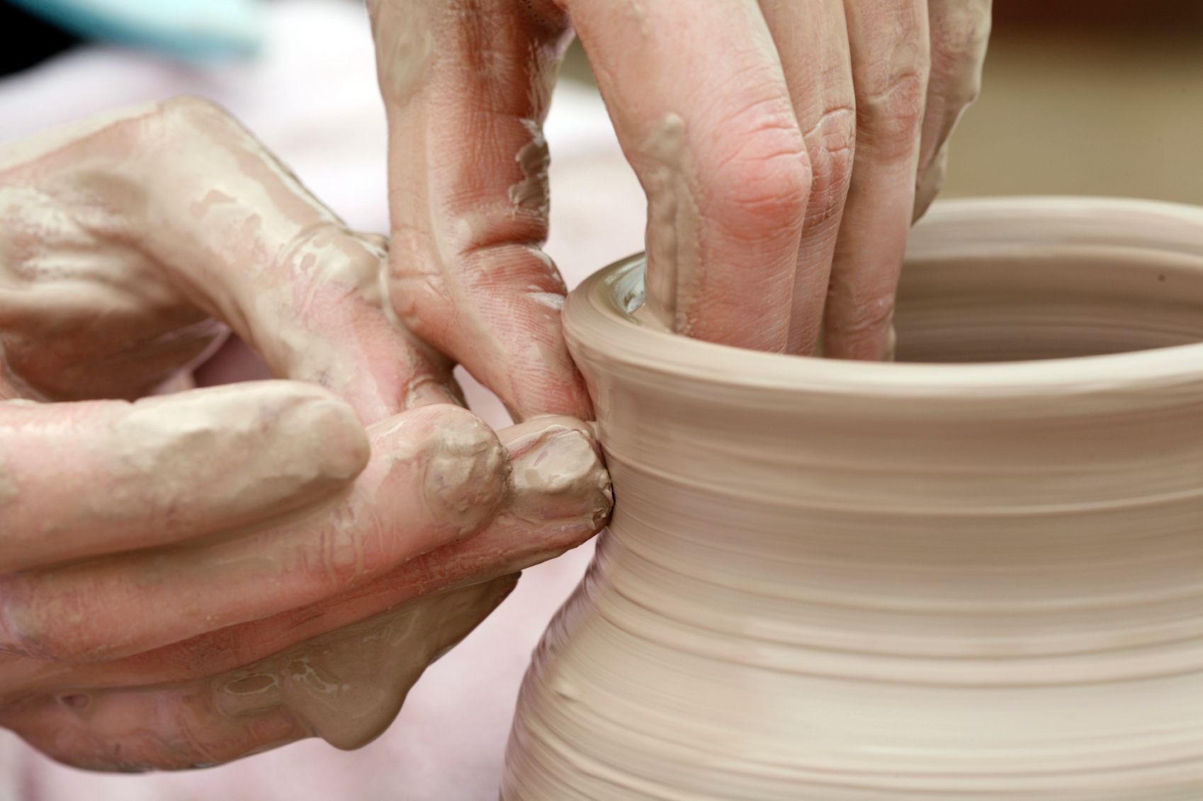 making pottery on the potter's wheel